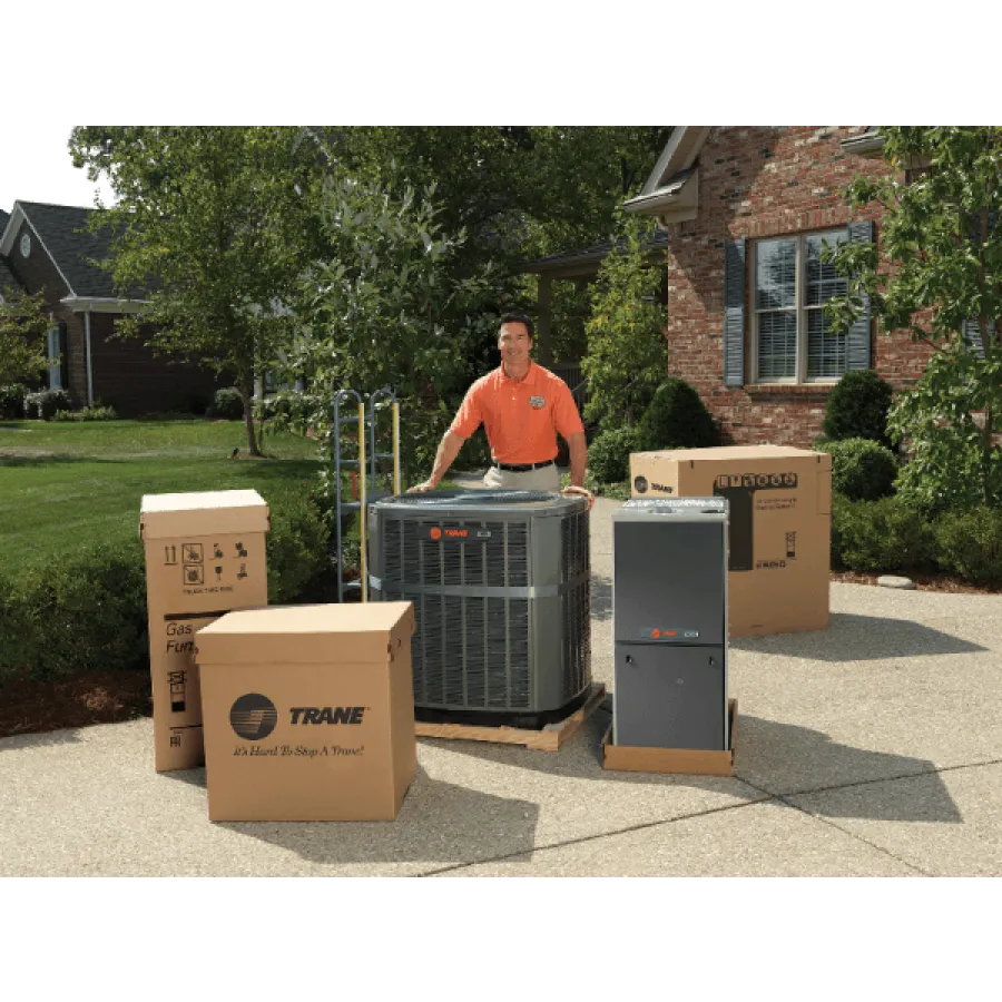 a man standing next to a stack of boxes