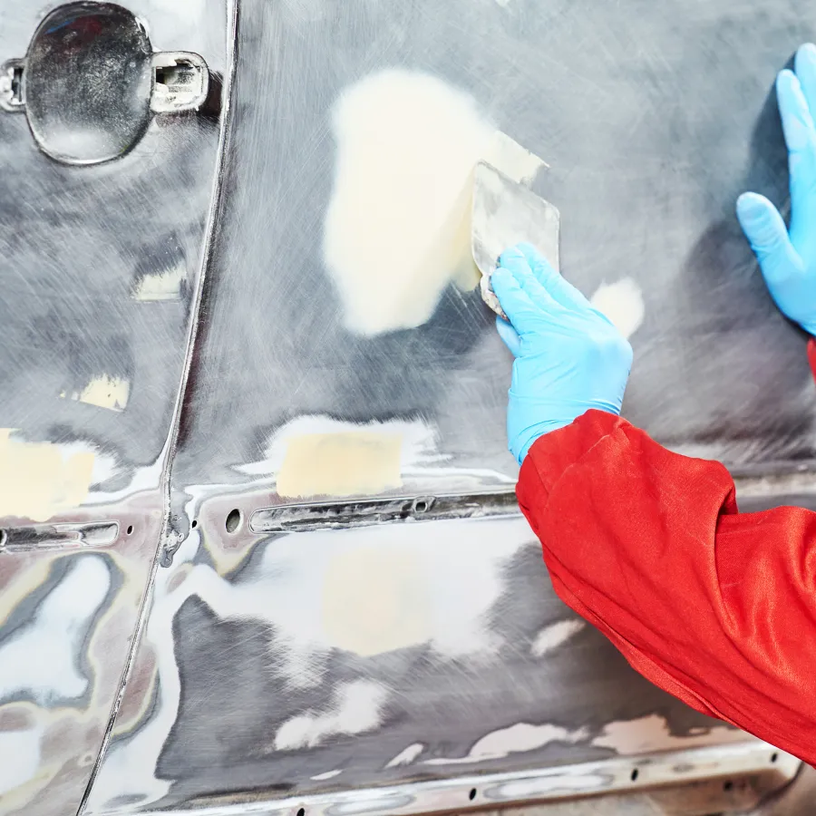 a person wearing gloves and gloves