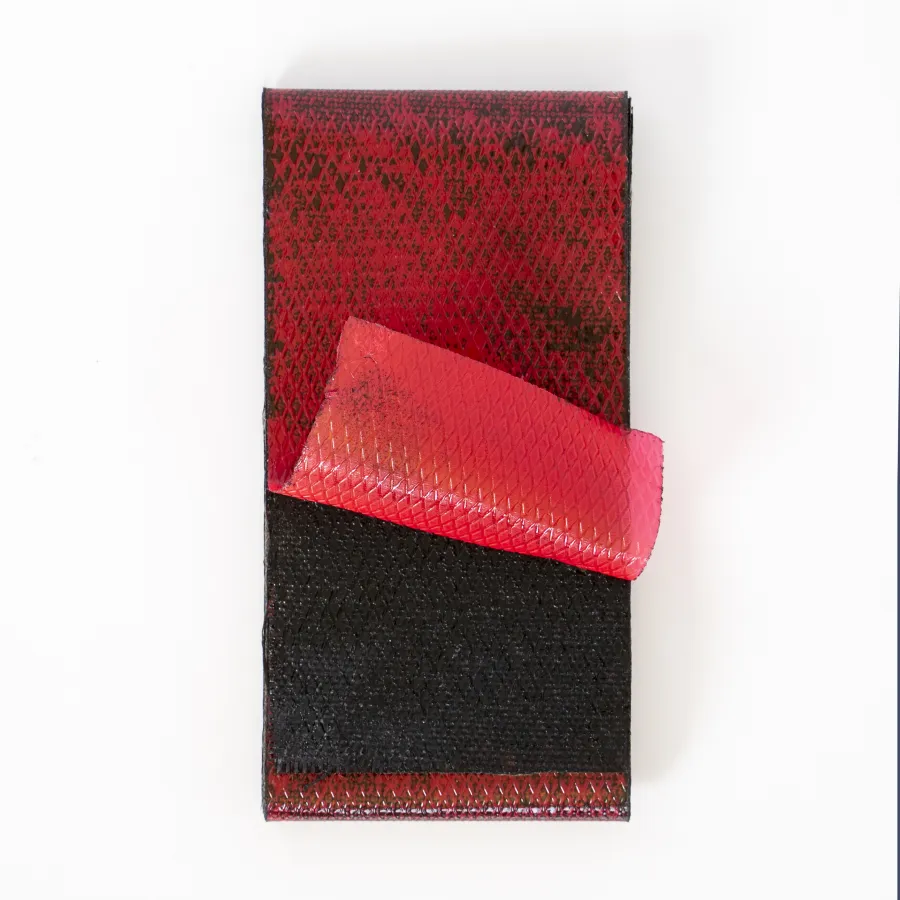 a red and black pillow
