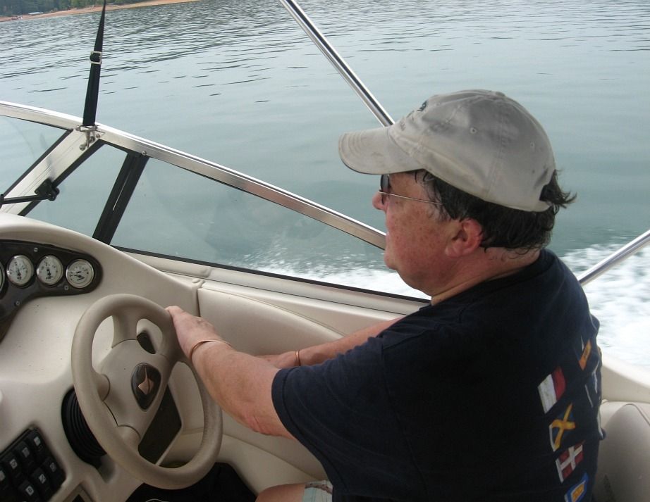Dr. Alford operating a boat
