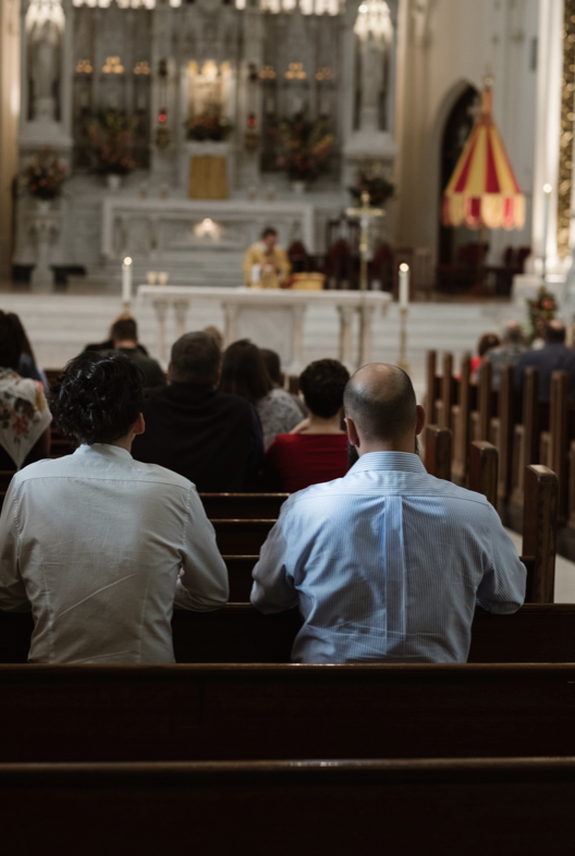 praying during mass
