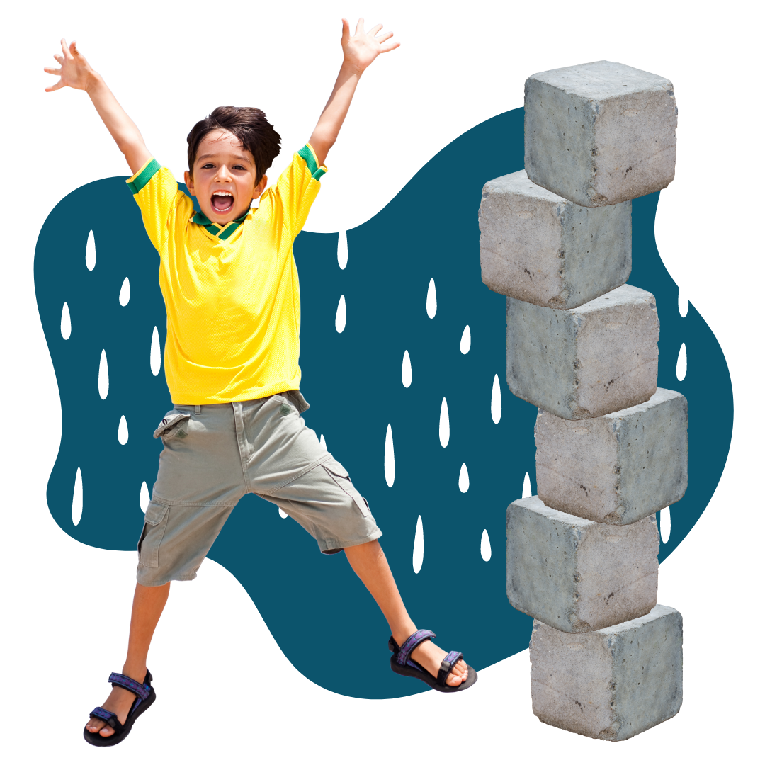 A boy and a stack of cinderblocks for height reference for how much 4 feet worth of rain is.