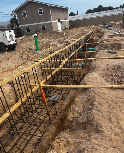 Construction site with helical pile foundation