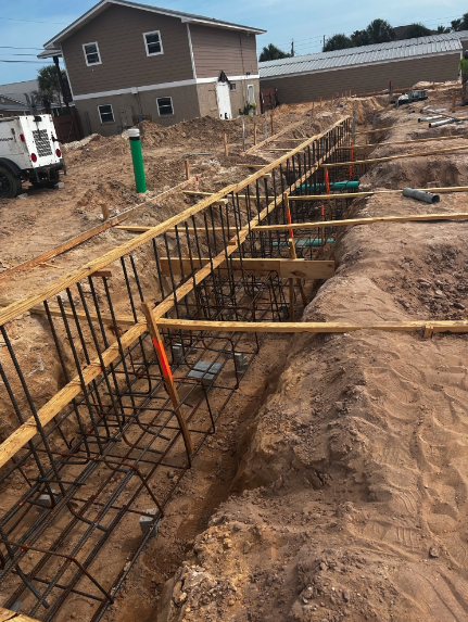 Construction site with helical pile foundation