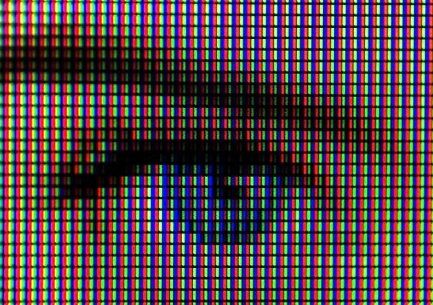 A close up view of the electronic pixels on a computer screen