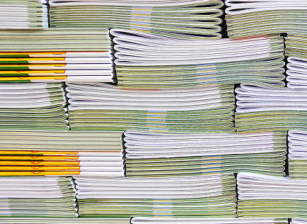 Stacks of Saddle Stitched Booklets