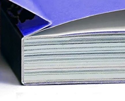 A close of a Hinge Score on a perfect bound book