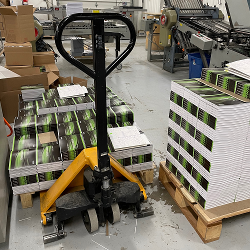Pallets of Perfect Bound Books in a Commercial Printing Plant 