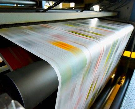 The paper of a roll fed Offset printing press flows through the press at high speed
