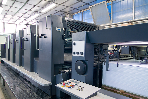 A sheet-fed offset printing press 