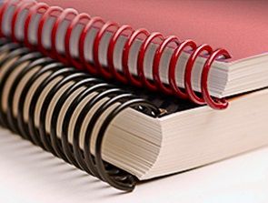 Two Spiral bound books in a stack