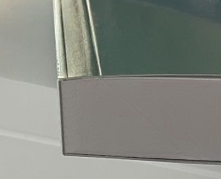 Close up of a softcover book's spine area
