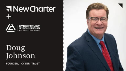 Professional headshot of Doug Johnson, founder of Cyber Trust, smiling in suit and red tie on white background.