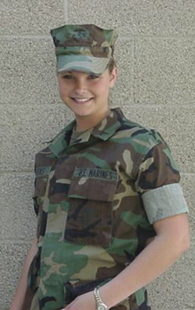 Marine veteran Ashley Chambless in uniform, reflecting her early years of service