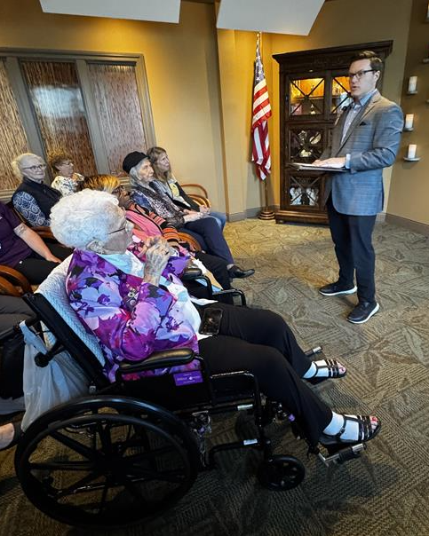 Suncoast Hospice Foundation President Adam Olson announcing the Dr. Mary Jean Etten Caregiver Advancement Endowment at the North Pinellas Care Center.