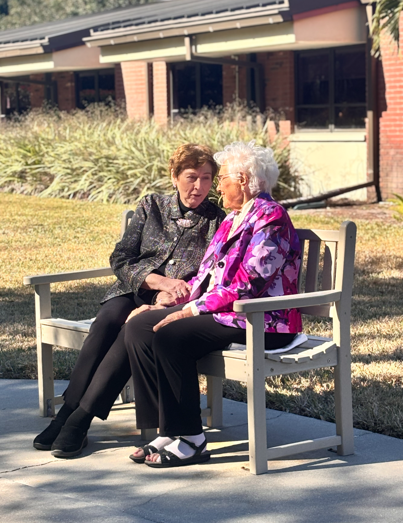 Dr. Mary Jean Etten sharing a moment with a longtime friend, Martha Lenderman