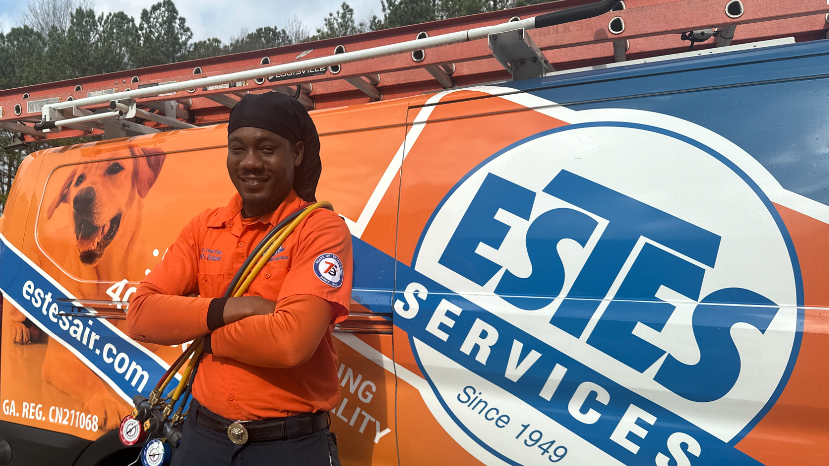 Estes Services tech close to an Estes Services Van