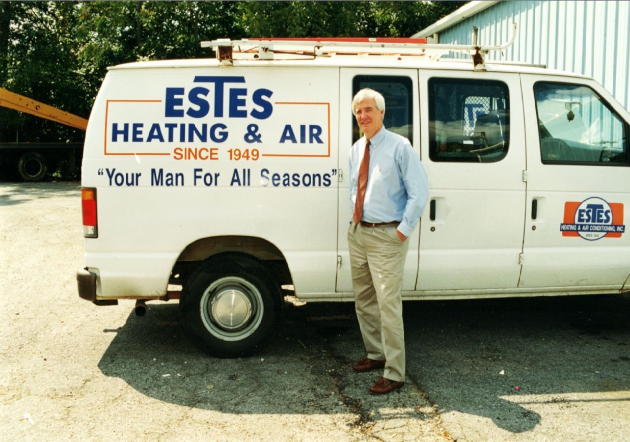 Tommy Estes in front of a Estes Truck