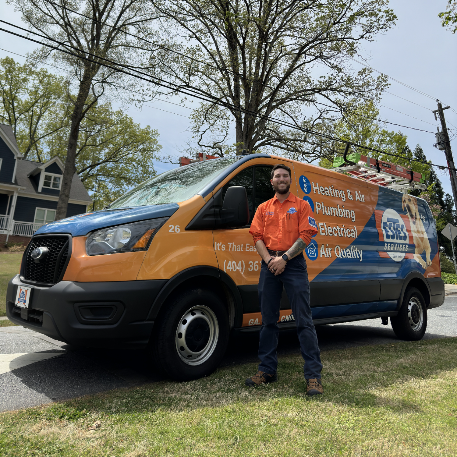 Estes Services Heating and Air Tech close to a Truck