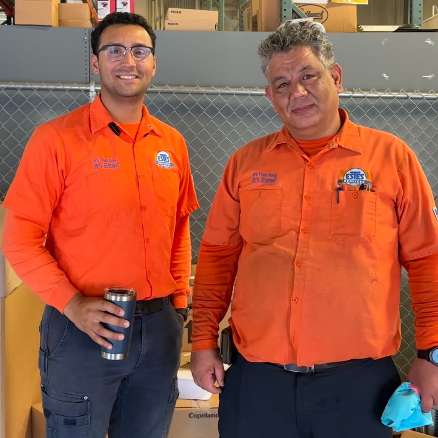 Nick and Jose. Estes Services Technicians in the Warehouse