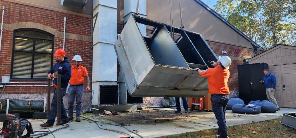 Estes Commercial HVAC Team installing a Equipment