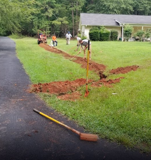 Estes preforming a sewer line replacement