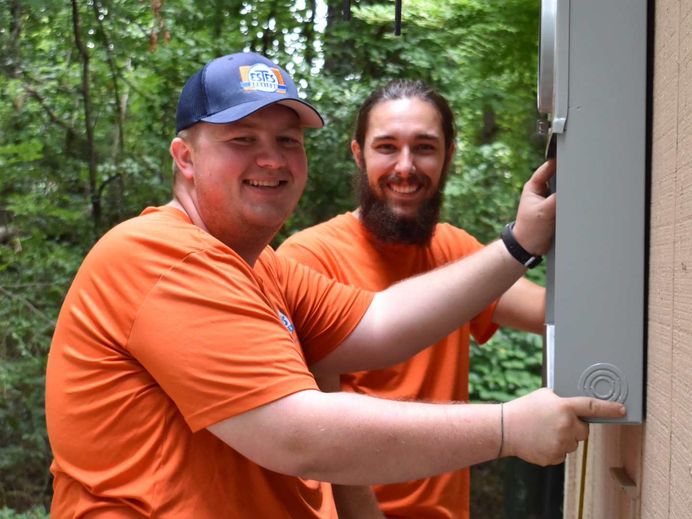 Estes Electricians Smiling. Electrical Panel Installation