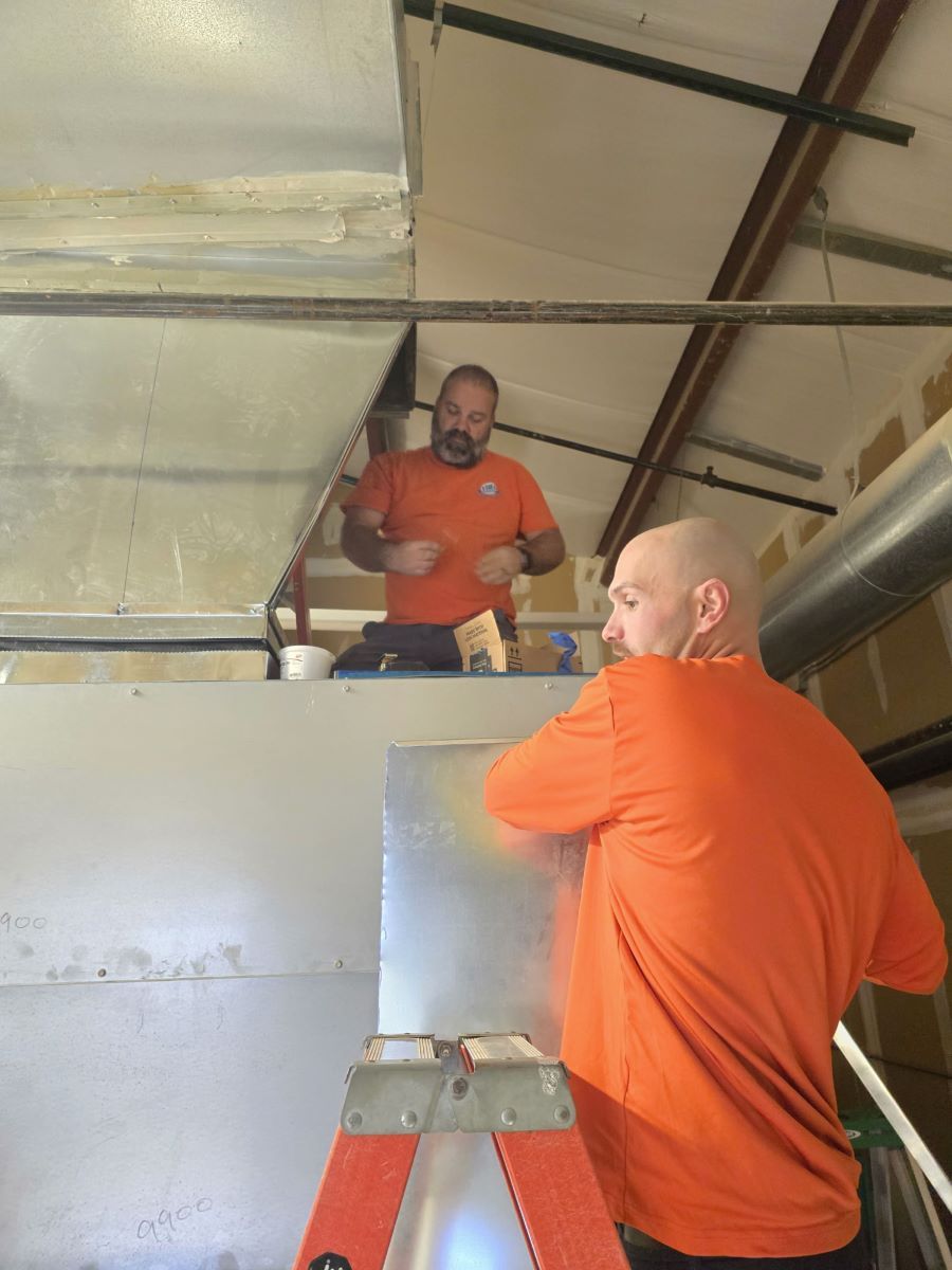Estes Techs installing an HVAC Commercial system in a school in Georgia