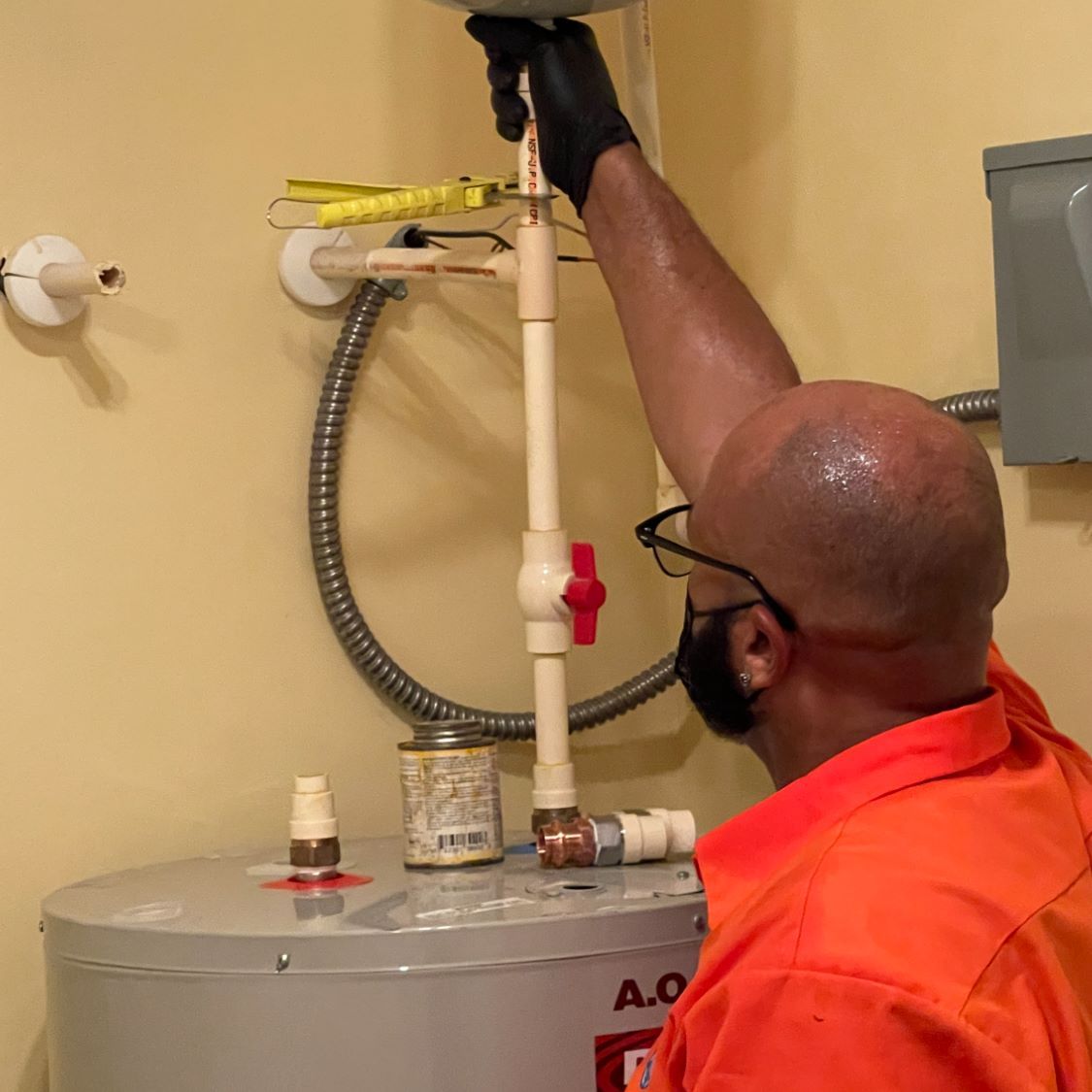 Estes Plumber installing a Tank Water Heater
