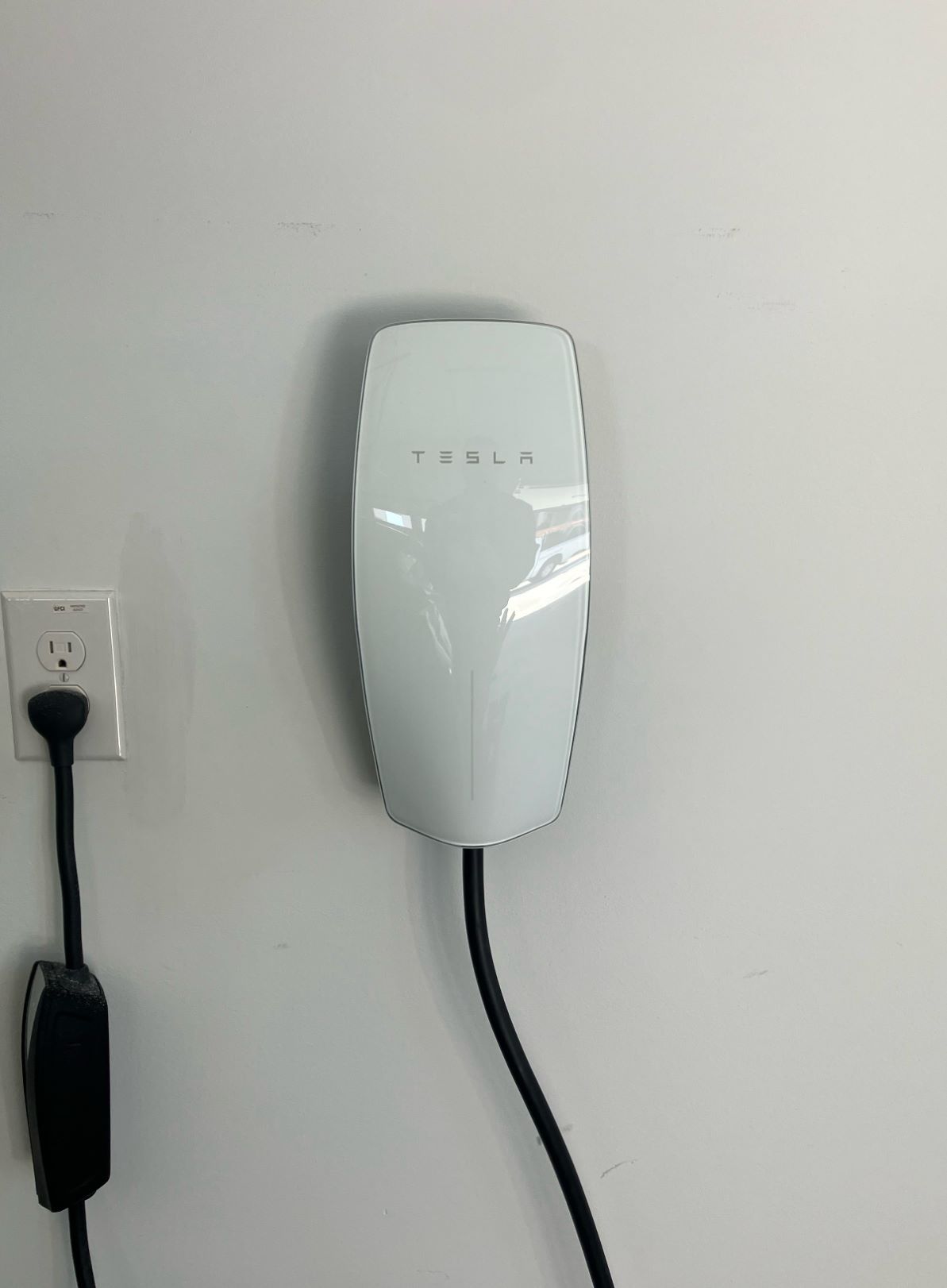 Tesla charger installed by Estes Services 