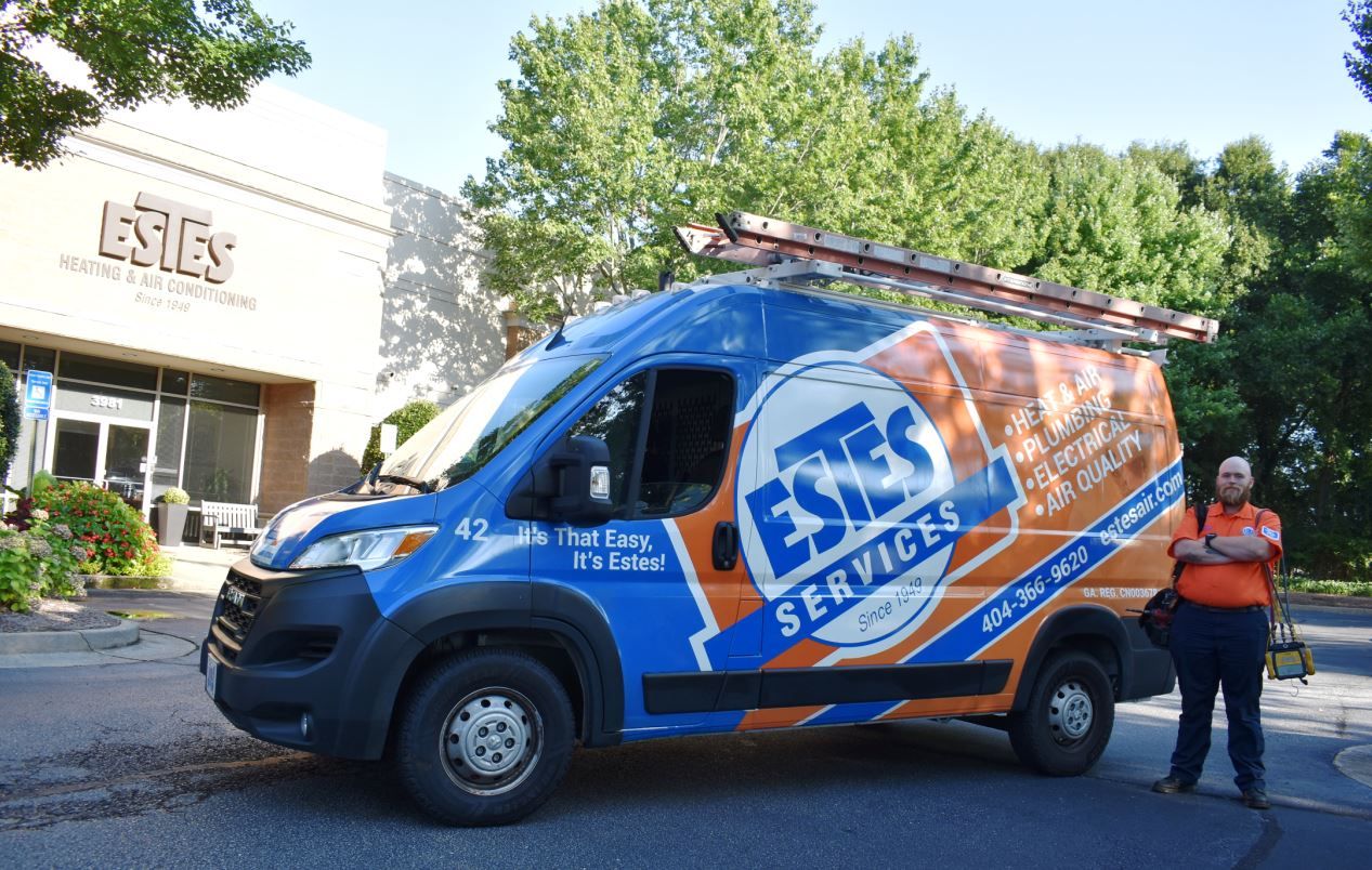 Estes Services Technician in front of his Estes Truck at Estes Services HQ in Atlanta