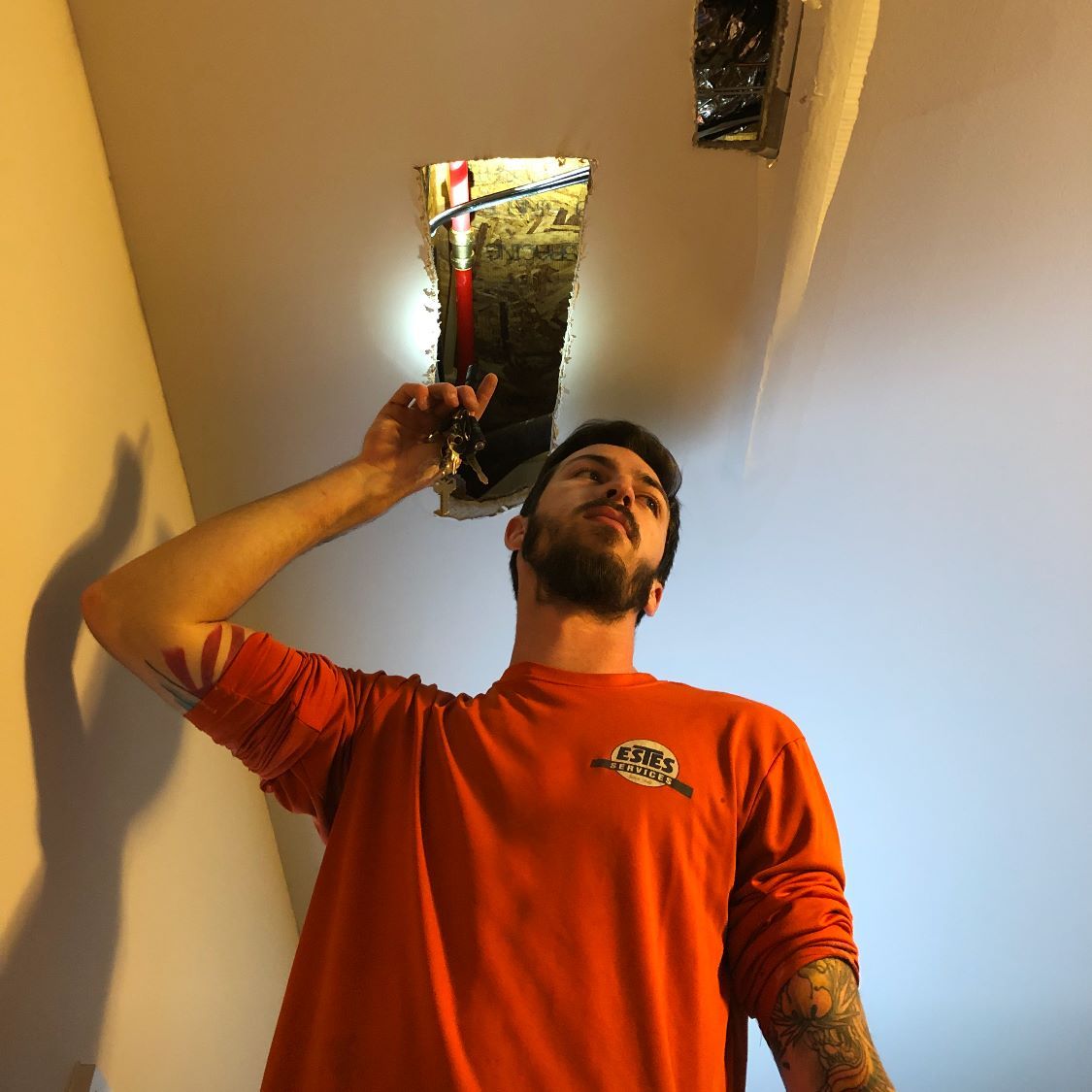 Estes Plumber fixing a ceiling Leak