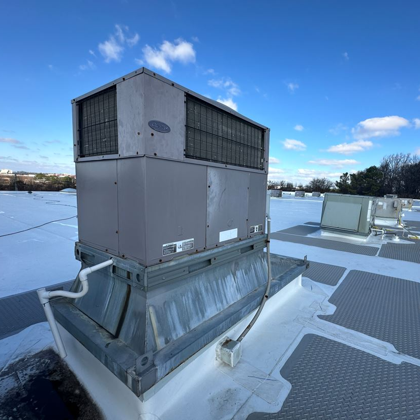 Carrier HVAC System on a rooftop. Estes Services maintains this equipment.