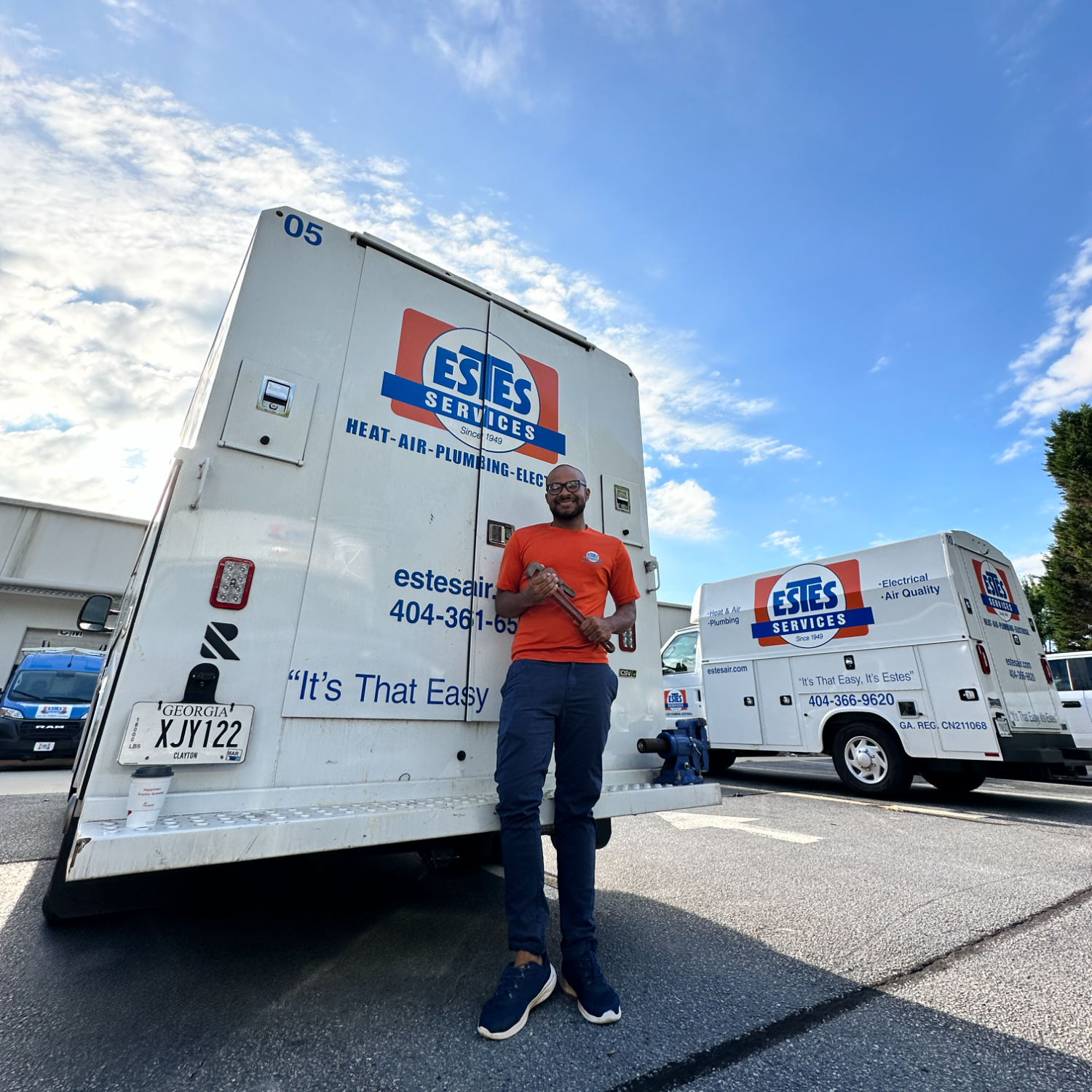 Estes Plumber in front of an Estes Truck