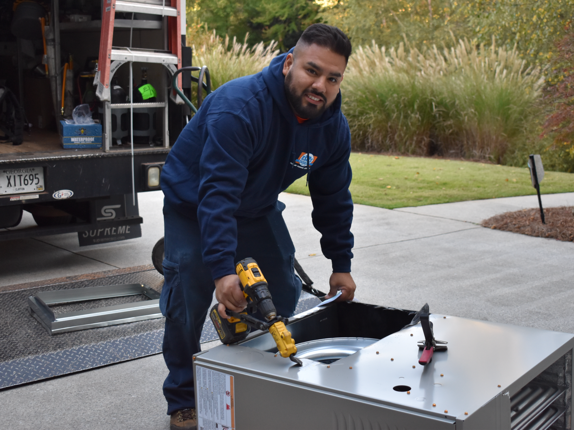 Estes Services Technician installing a Carrier Furnace in Metro Atlanta Area