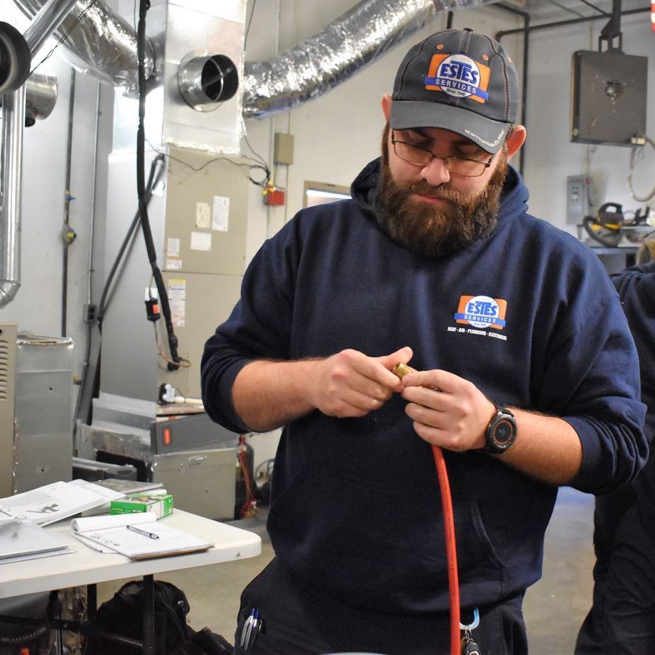 Tech Builder working in Estes University Lab