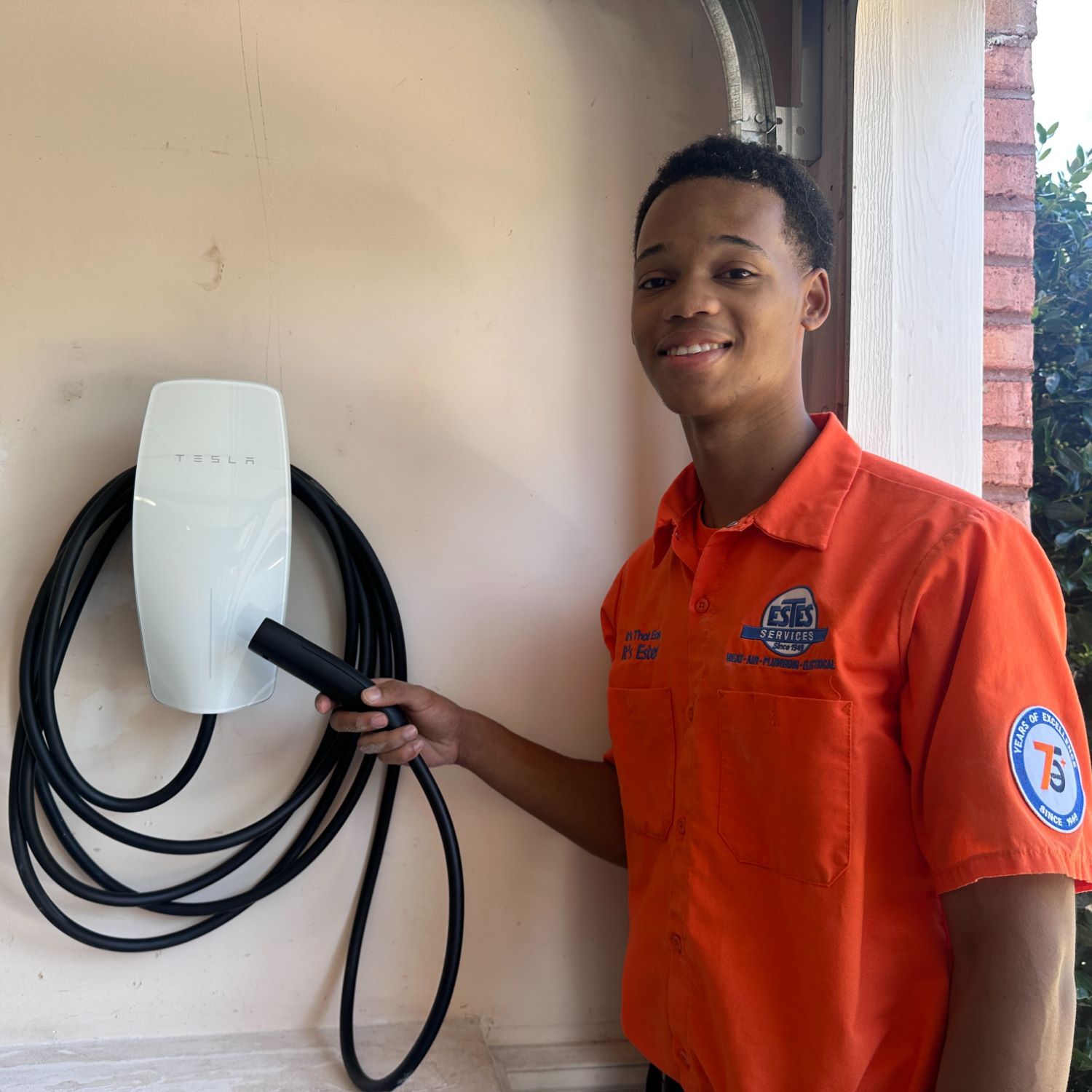 Estes Services Electrician installing a EV Charger in Marietta, Georgia