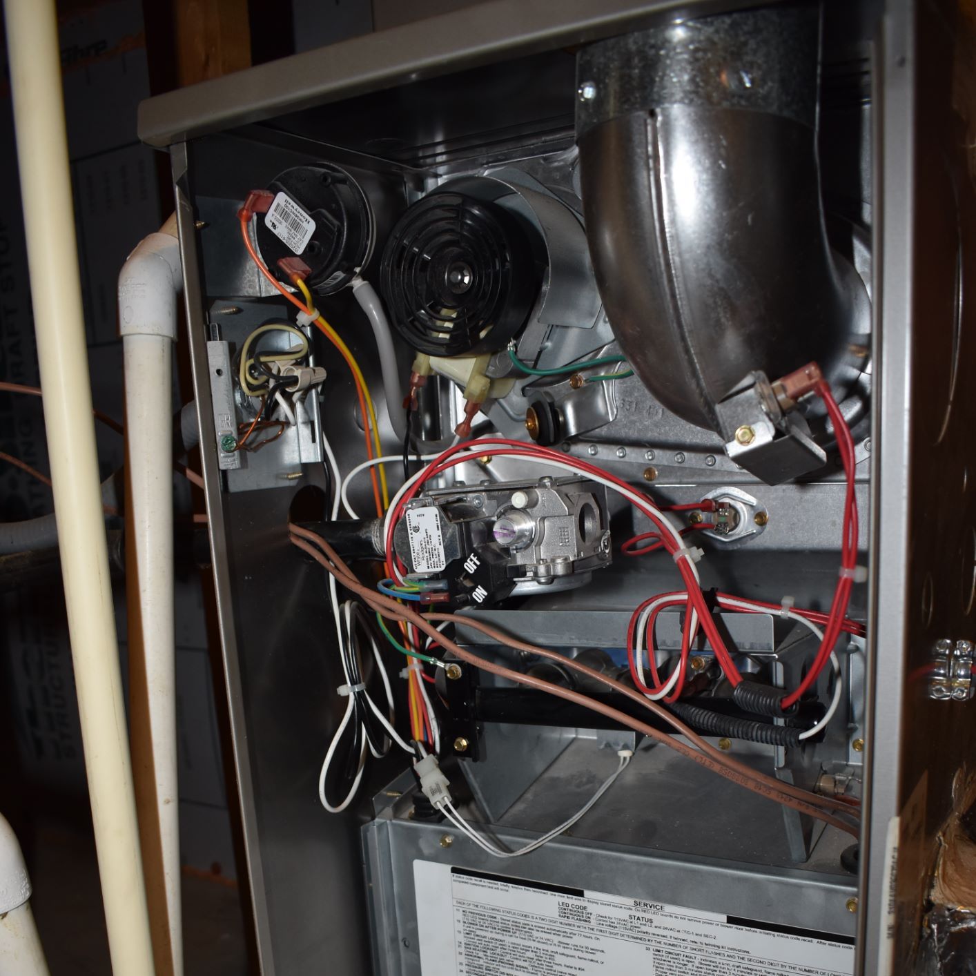 Estes technician during maintenance is checking if there are evaporator coil issues