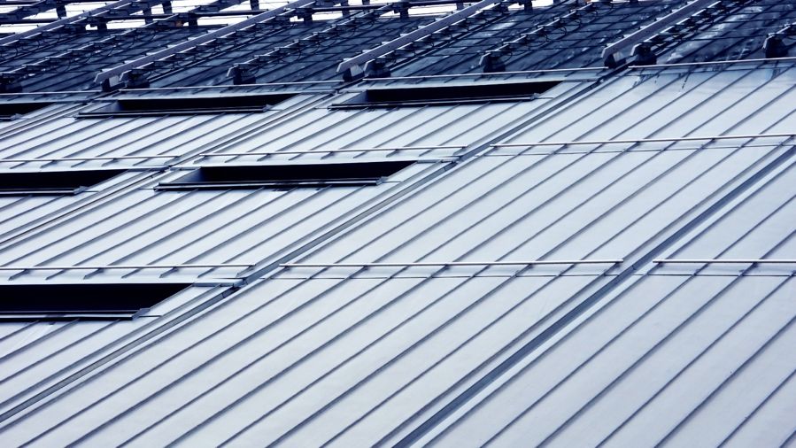 A close-up picture of a seam metal roof.
