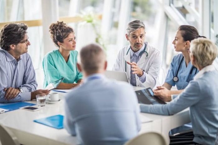 Healthcare professionals around a table