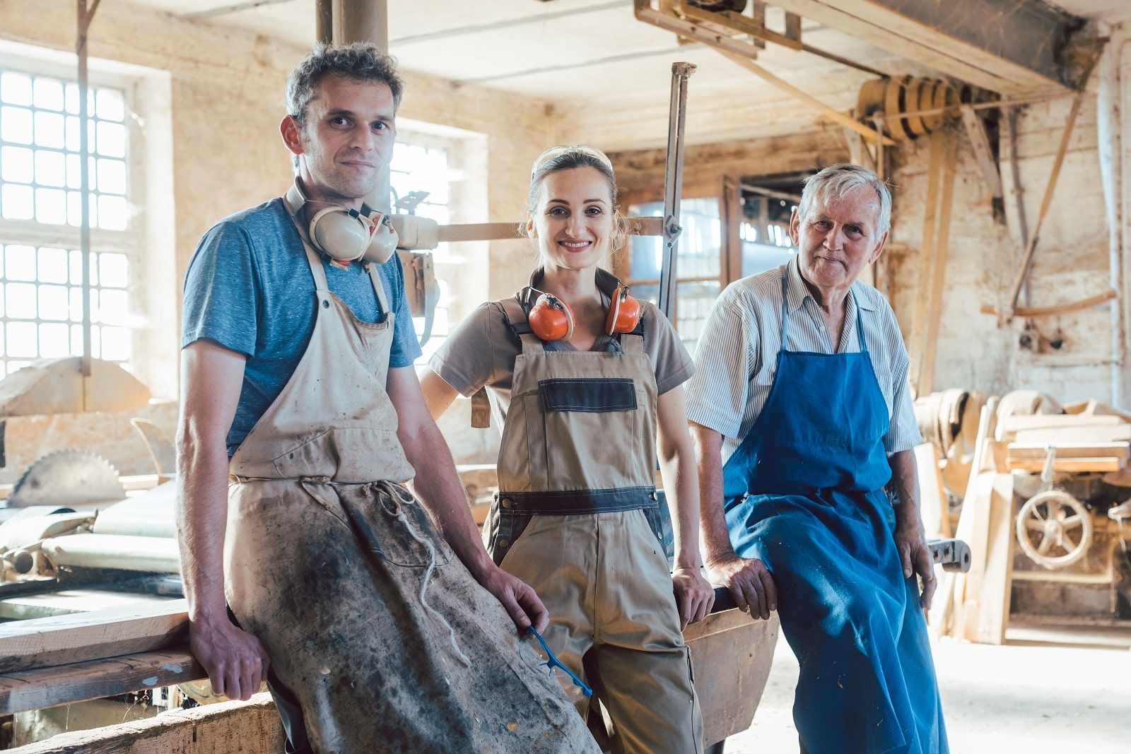 a group of people working in woodshed