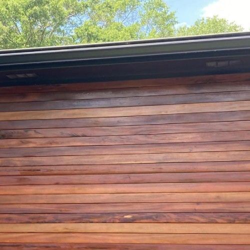 Close-up of Brazilian hardwood horizontal siding panels installed by Nelson Exteriors