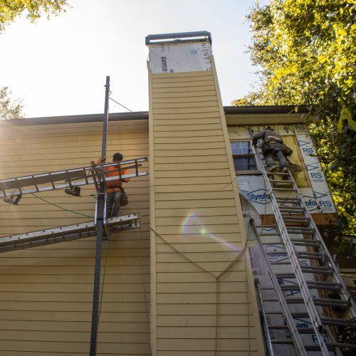 Nelson Exteriors team installing James Hardie siding as a certified Elite Preferred Contractor serving North Metro Atlanta by Nelson Exteriors | Siding Contractor & Exteriors Marietta