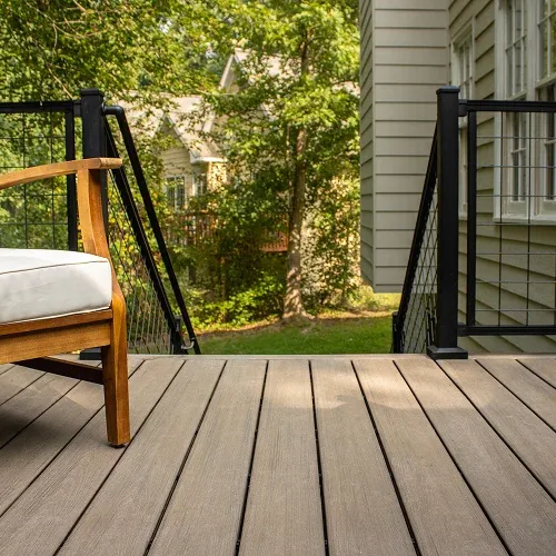 Custom composite wood deck installation with black railing by Nelson Exteriors in Atlanta, GA