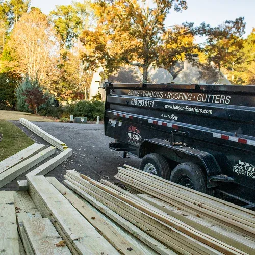 Deck installation materials and Nelson Exteriors trailer prepared for project in Metro Atlanta