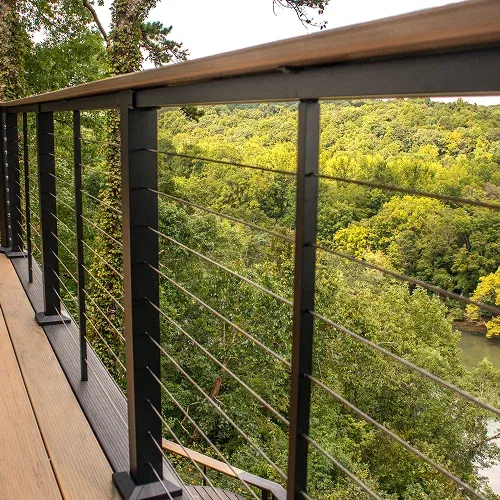 Elevated multi-level deck with wooden finish and railing by Nelson Exteriors in Marietta