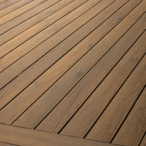 Cable railing feature on custom deck with forest view by Nelson Exteriors in Marietta