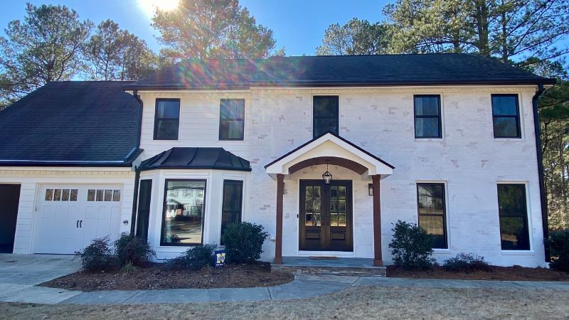 White home with stunning black trim Marvin Windows