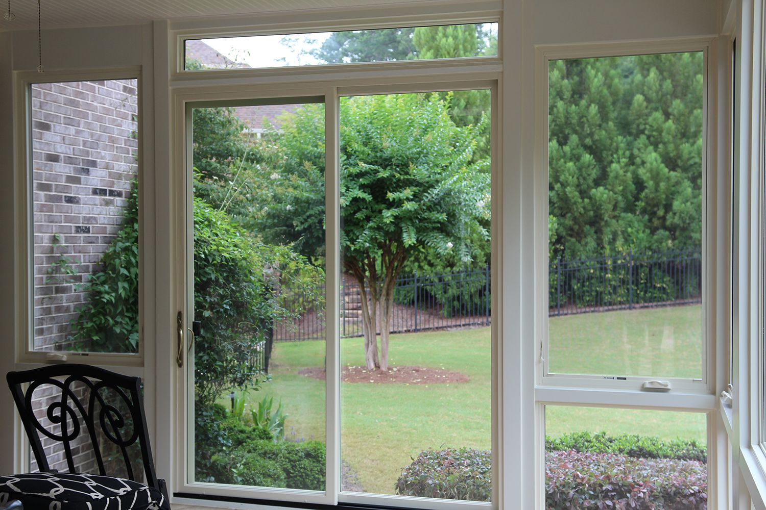 Sliding patio door in a sunroom built by North Georgia Replacement Windows