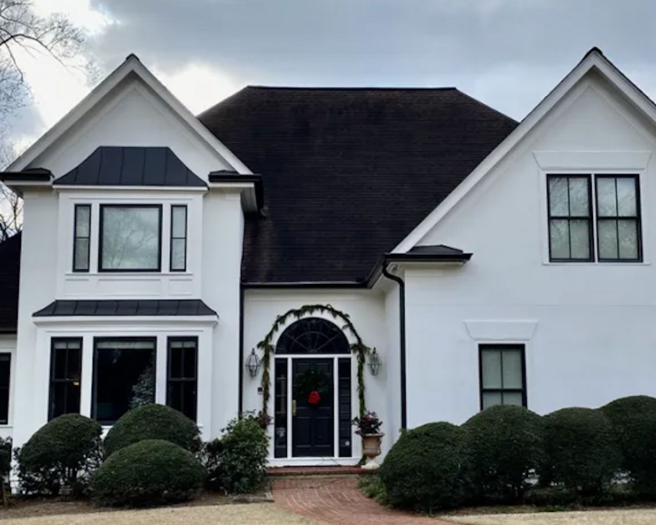 white home with black trim window installation by north georgia window replacement
